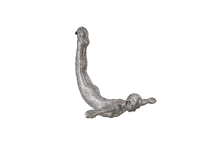 the Phillips Collection Leaping Diver Wall Sculpture a silver sculpture with a striated surface that brings it a heavy dose of texture