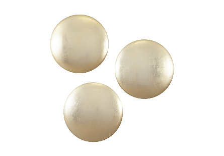 front view of the Phillips Collection Orb Gold Wall Tile Set that includes three perfectly round wall sculptures made of composite in a gold leaf finish